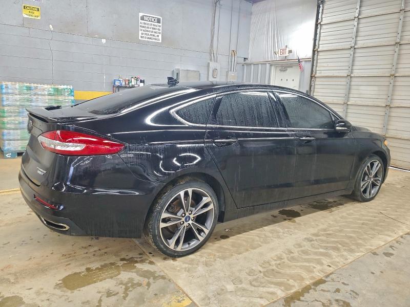 Photo 3 from auction – 2019 FORD FUSION TIT with VIN 3FA6P0D96KR124135