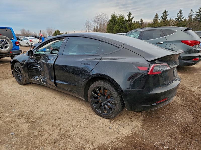 Photo 2 from auction – 2023 TESLA MODEL 3 with VIN 5YJ3E1EA4PF384852