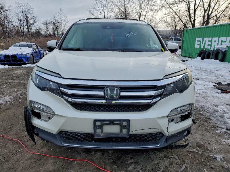 Photo 5 from auction – 2016 HONDA PILOT TOUR with VIN 5FNYF6H91GB031874