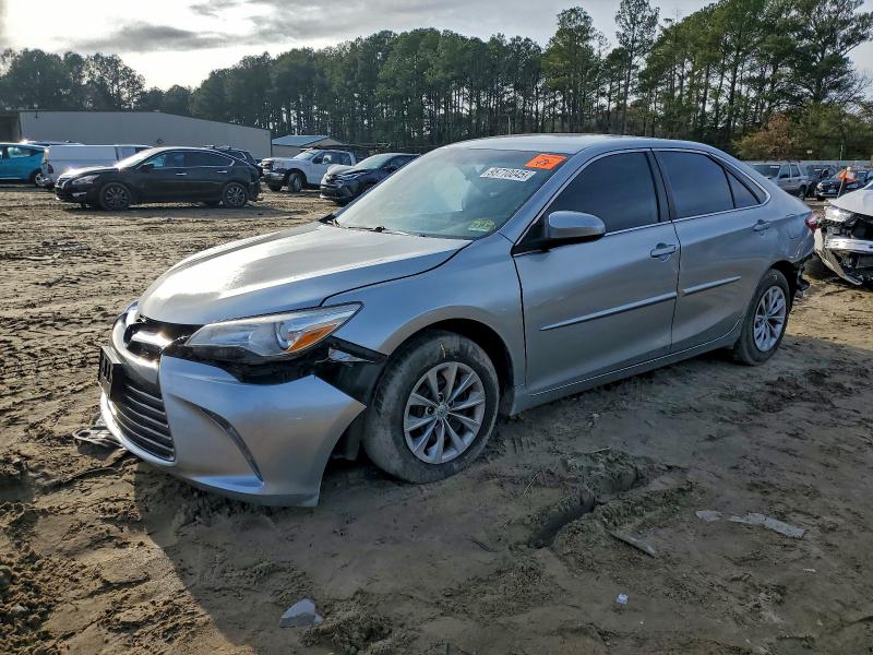 TOYOTA CAMRY LE 2017 with VIN 4T1BF1FK5HU674859 - Photo from auction