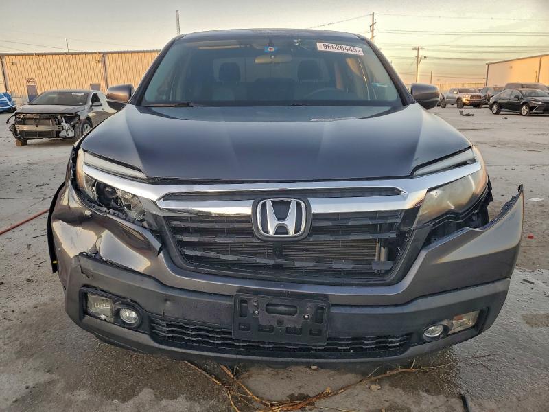 Photo 5 from auction – 2017 HONDA RIDGELINE with VIN 5FPYK2F46HB007476