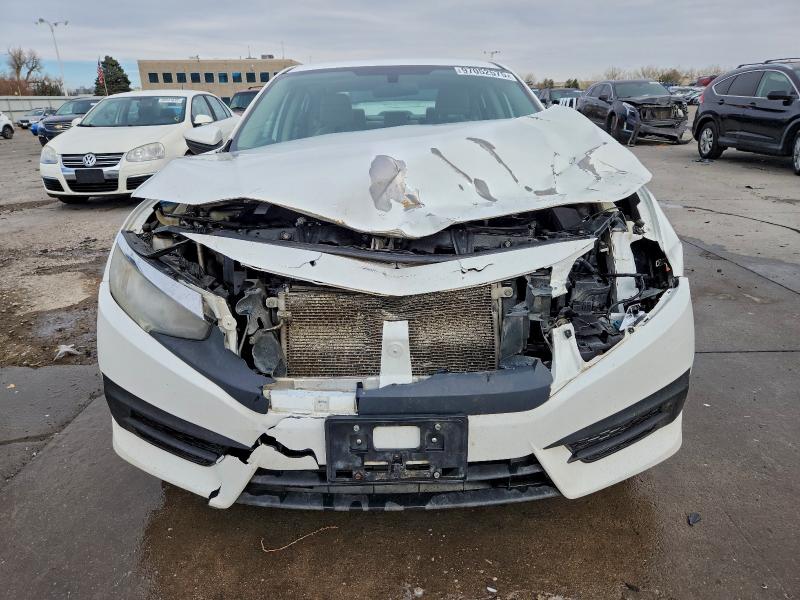 Photo 5 from auction – 2016 HONDA CIVIC LX with VIN 19XFC2F57GE022451