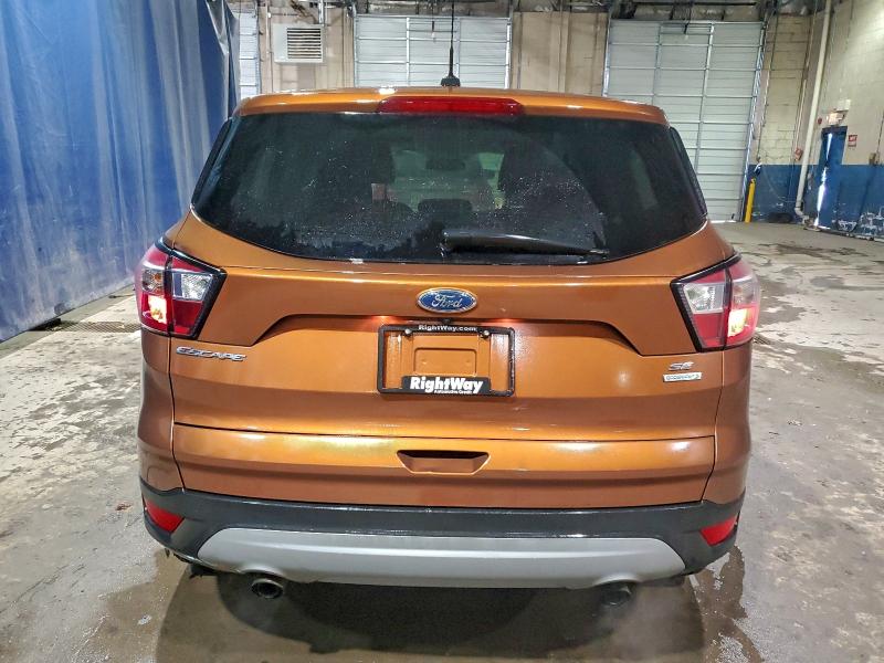 Photo 6 from auction – 2017 FORD ESCAPE SE with VIN 1FMCU0GD4HUD52024
