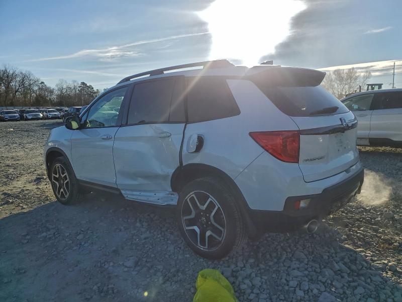 Photo 2 from auction – 2022 HONDA PASSPORT E with VIN 5FNYF8H0XNB010614