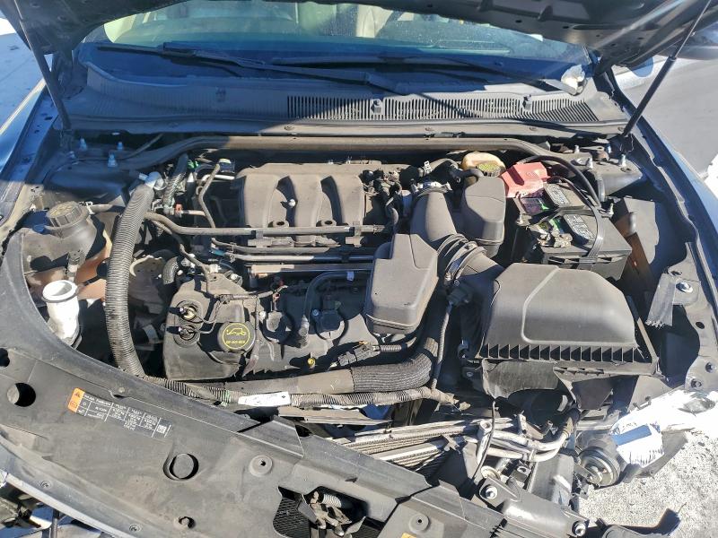 Photo 11 from auction – 2015 FORD TAURUS SE with VIN 1FAHP2D87FG175748
