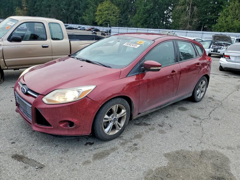 FORD FOCUS SE 2014 with VIN 1FADP3K21EL323580 - Photo from auction