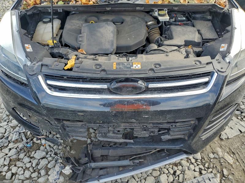 Photo 12 from auction – 2014 FORD ESCAPE TIT with VIN 1FMCU9J93EUA02520