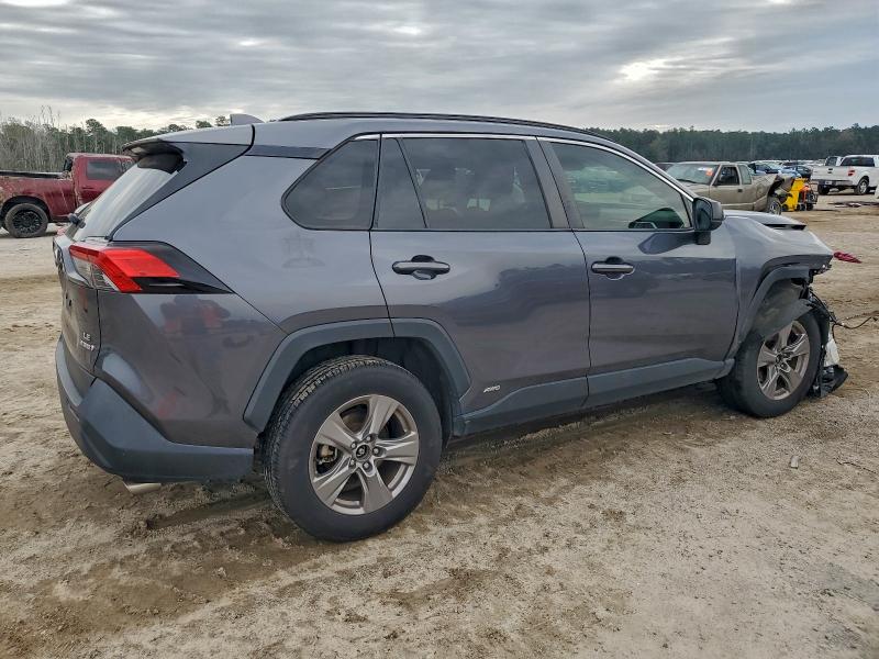 Photo 3 from auction – 2022 TOYOTA RAV4 LE with VIN JTMLWRFV4ND156142