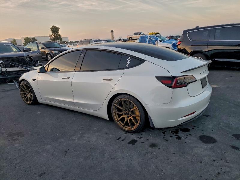 Photo 2 from auction – 2022 TESLA MODEL 3 with VIN 5YJ3E1EA7NF167664