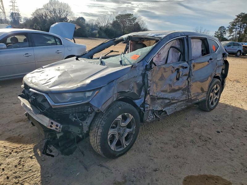HONDA CR-V EX 2017 with VIN 7FARW1H58HE006044 - Photo from auction