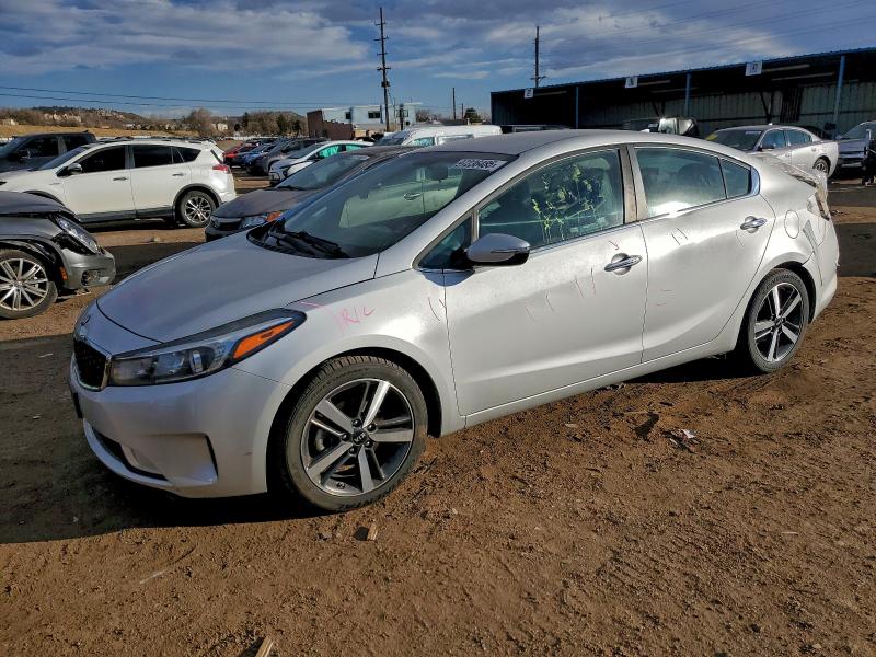 KIA FORTE EX 2018 with VIN 3KPFL4A87JE237056 - Photo from auction