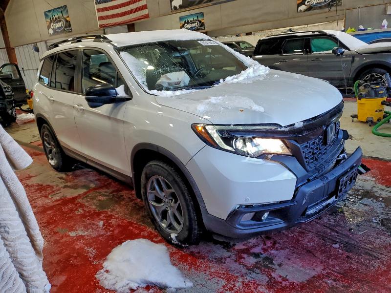 Photo 4 from auction – 2020 HONDA PASSPORT E with VIN 5FNYF8H54LB500877