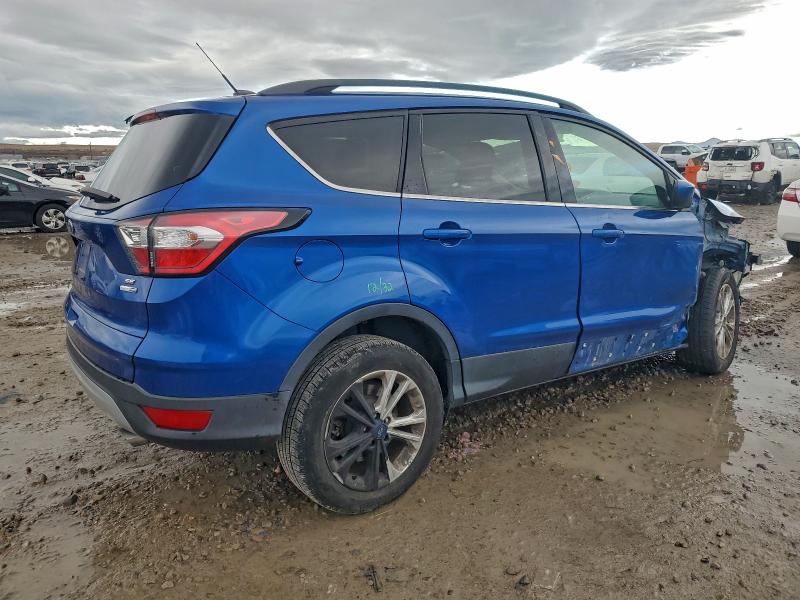 Photo 3 from auction – 2018 FORD ESCAPE SE with VIN 1FMCU9GD2JUC50179