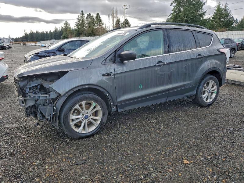 FORD ESCAPE SE 2018 with VIN 1FMCU0GD3JUB76279 - Photo from auction