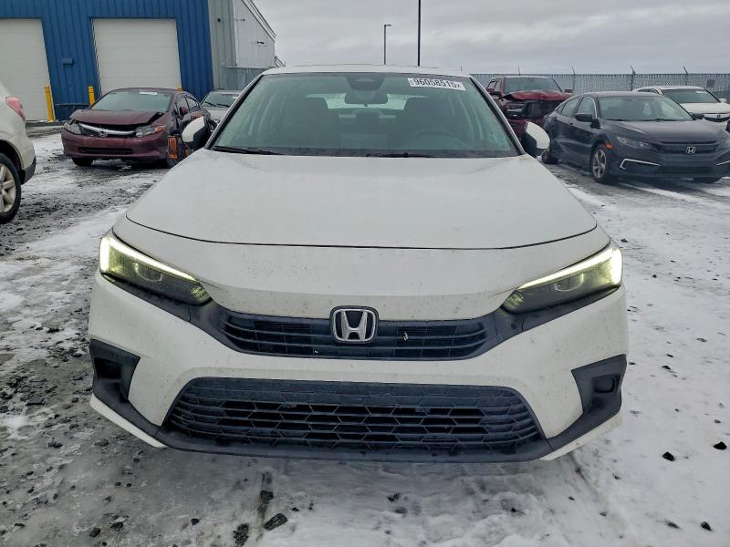 Photo 5 from auction – 2022 HONDA CIVIC EX with VIN 2HGFE2F35NH131440