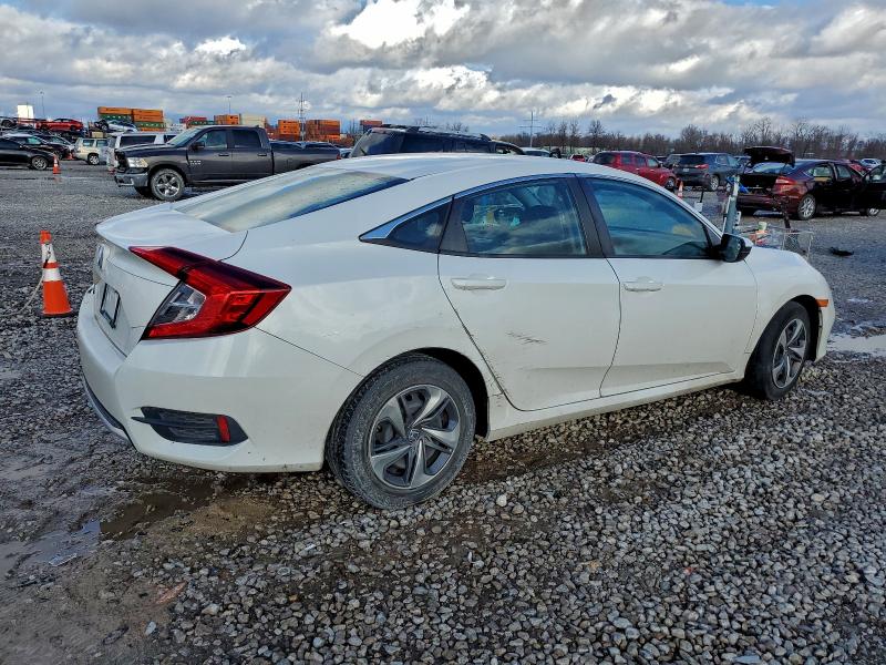 Photo 3 from auction – 2021 HONDA CIVIC LX with VIN 2HGFC2F66MH559645