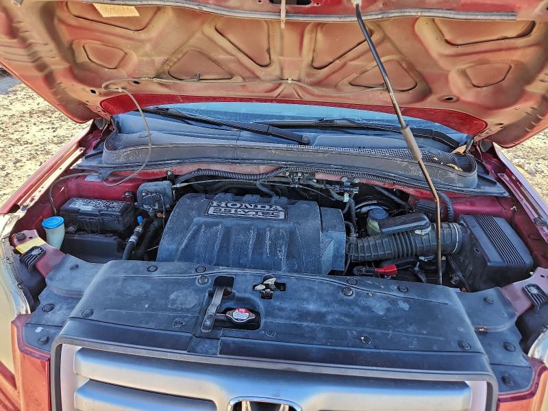 Photo 11 from auction – 2006 HONDA PILOT LX with VIN 5FNYF28136B027214