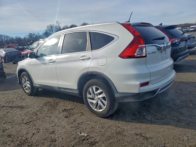 Photo 2 from auction – 2015 HONDA CR-V EXL with VIN 5J6RM4H70FL096718