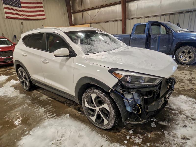 Photo 4 from auction – 2016 HYUNDAI TUCSON LIM with VIN KM8J3CA42GU040092