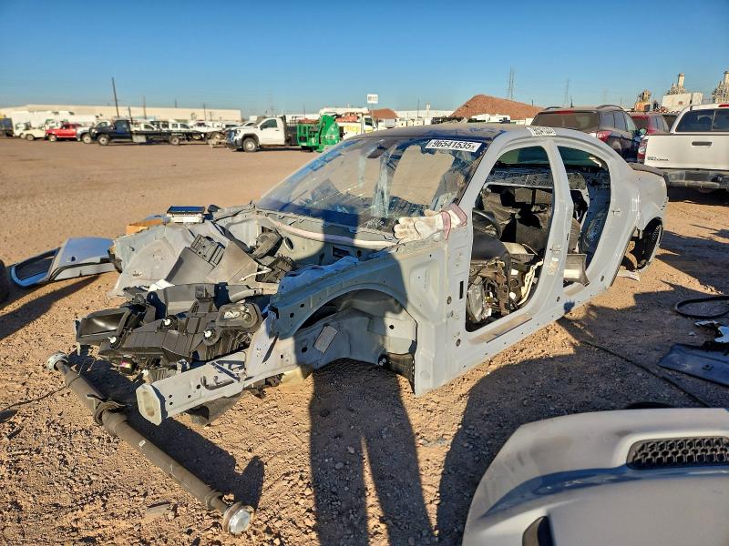 DODGE CHARGER 2021 with VIN 2C3CDXGJ9MH581092 - Photo from auction
