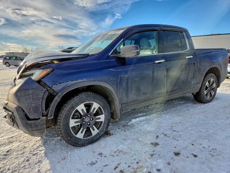 HONDA RIDGELINE 2017 with VIN 5FPYK3F7XHB506359 - Photo from auction