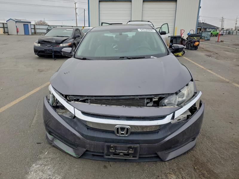 Photo 5 from auction – 2018 HONDA CIVIC EX with VIN 2HGFC2F74JH571247