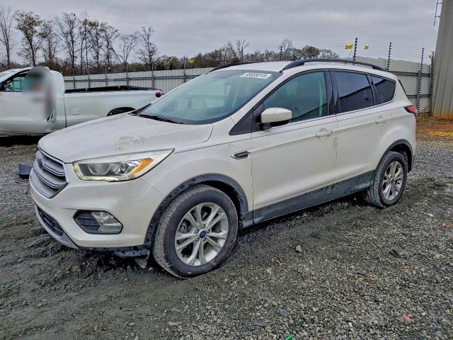 FORD ESCAPE 2018 with VIN 1FMCU0HD7JUC26633 - Photo from auction