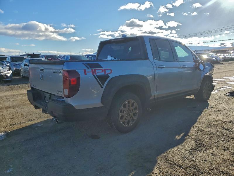 Photo 3 from auction – 2021 HONDA RIDGELINE with VIN 5FPYK3F14MB009989