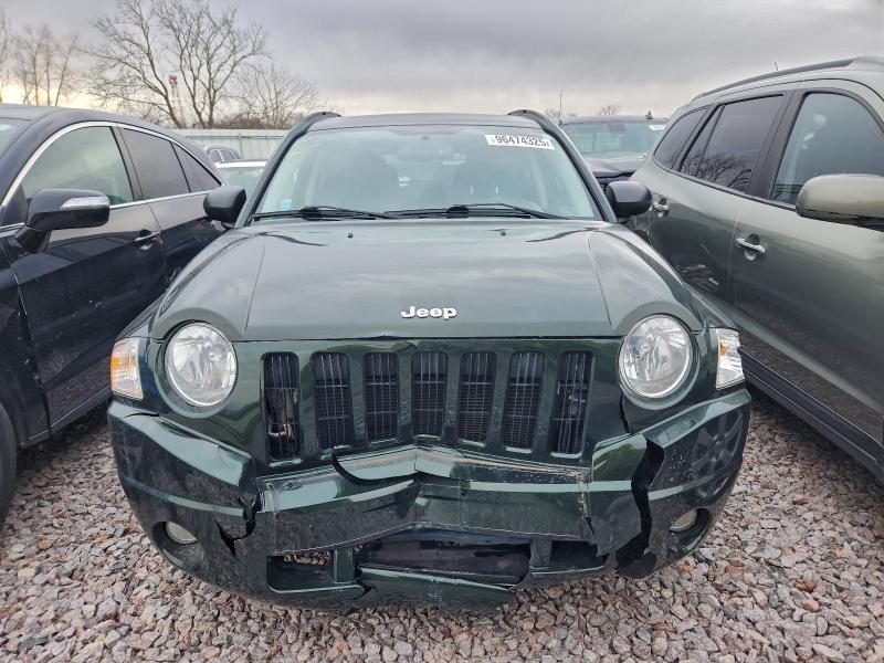 Photo 5 from auction – 2010 JEEP COMPASS LI with VIN 1J4NF5FB2AD640807
