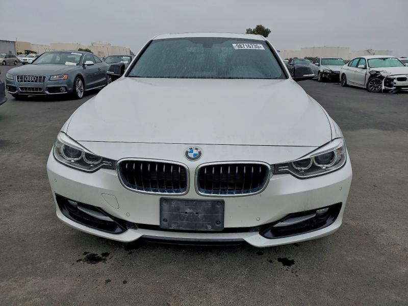 Photo 5 from auction – 2014 BMW 3 SERIES with VIN WBA3D3C57EK153574