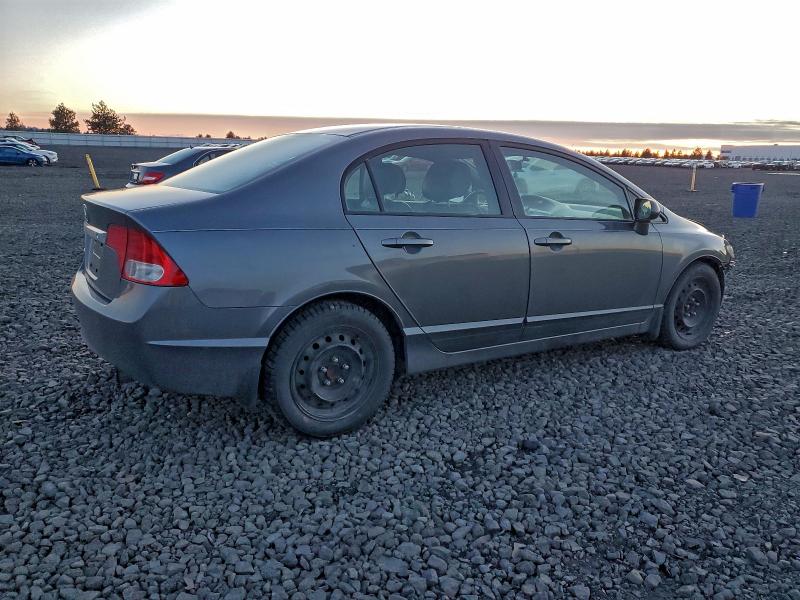 Photo 3 from auction – 2011 HONDA CIVIC LX with VIN 19XFA1F56BE008775