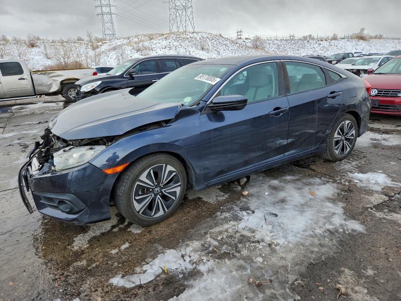 HONDA CIVIC EX 2016 with VIN 19XFC1F38GE042698 - Photo from auction