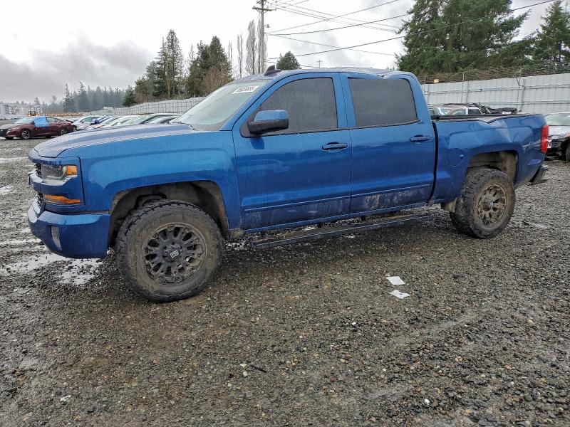 CHEVROLET SILVERADO 2018 with VIN 3GCUKRER7JG200619 - Photo from auction
