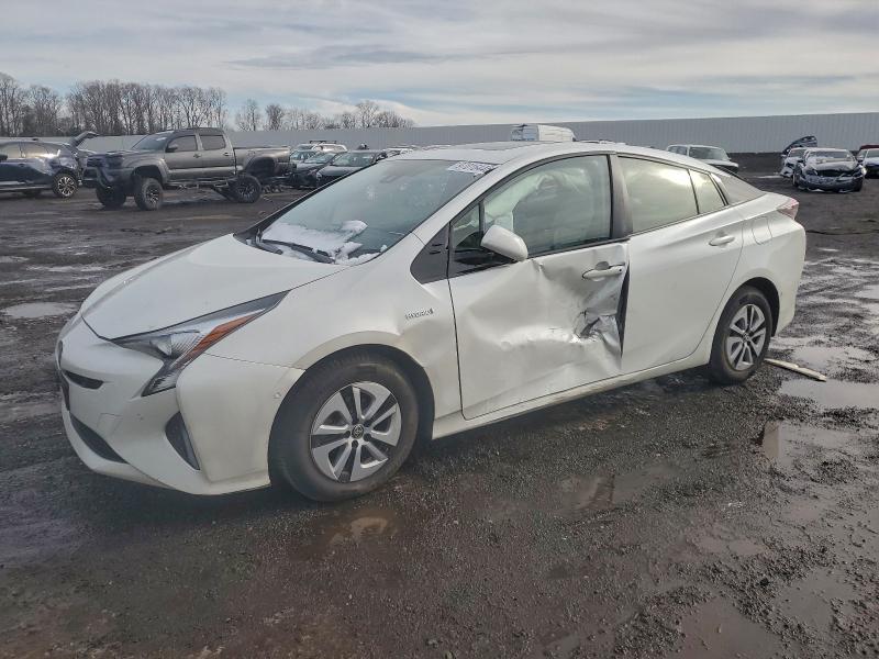 TOYOTA PRIUS 2018 with VIN JTDKARFU0J3057951 - Photo from auction