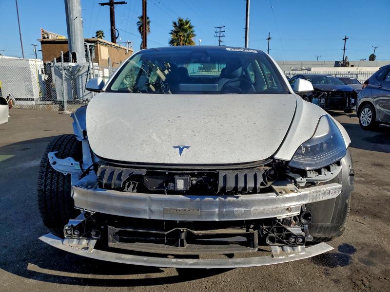Photo 5 from auction – 2022 TESLA MODEL 3 with VIN 5YJ3E1EB0NF130383