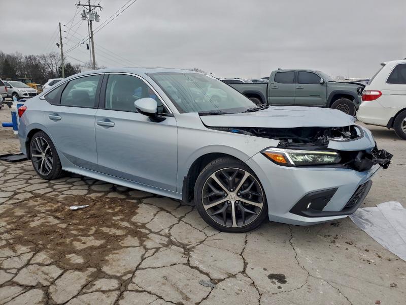 Photo 4 from auction – 2023 HONDA CIVIC TOUR with VIN 2HGFE1F96PH301659