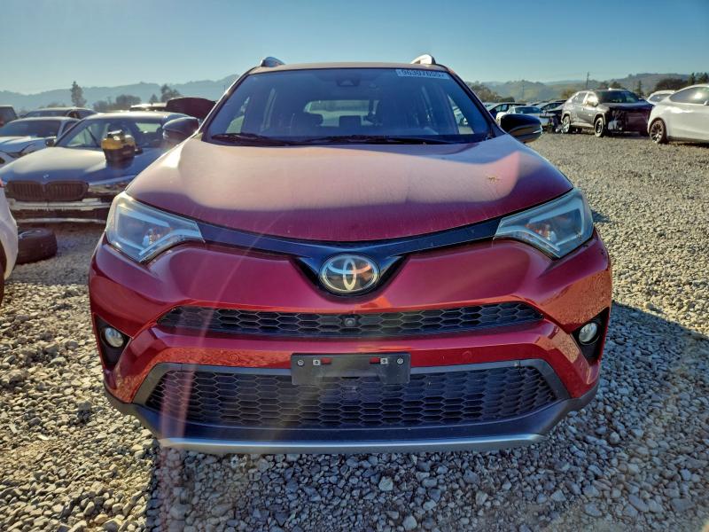 Photo 5 from auction – 2016 TOYOTA RAV4 SE with VIN JTMNFREV8GJ090404