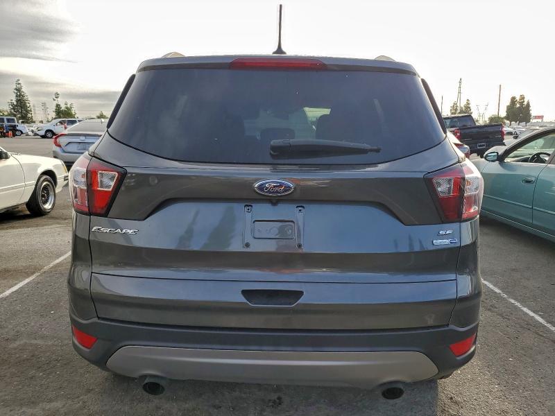 Photo 6 from auction – 2018 FORD ESCAPE SE with VIN 1FMCU9GD1JUB28073