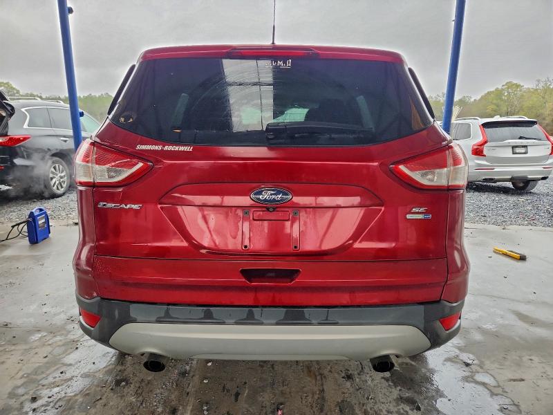 Photo 6 from auction – 2015 FORD ESCAPE SE with VIN 1FMCU9GX5FUC72310