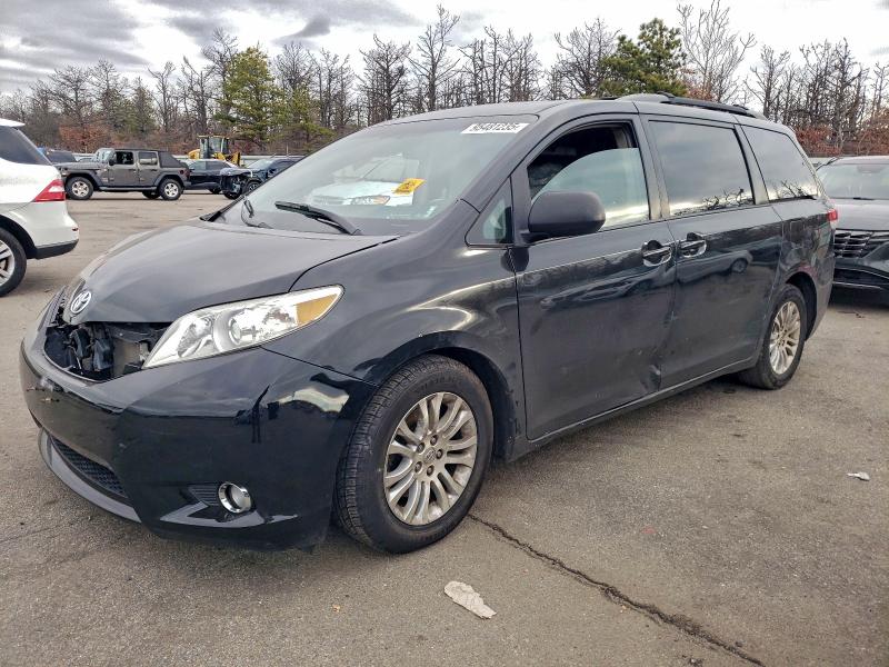 Photo 1 from auction – 2014 TOYOTA SIENNA XLE with VIN 5TDYK3DC7ES474227