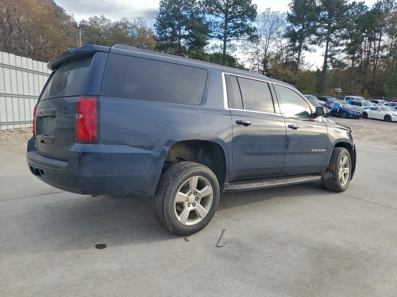 Photo 3 from auction – 2019 CHEVROLET SUBURBAN with VIN 1GNSCHKC7KR124682