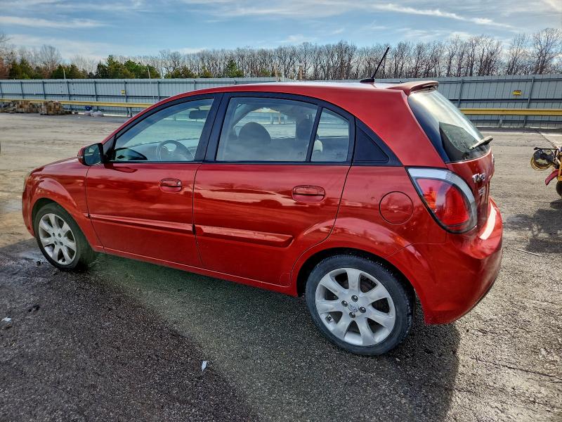 Photo 2 from auction – 2010 KIA RIO LX with VIN KNADH5A31A6659118