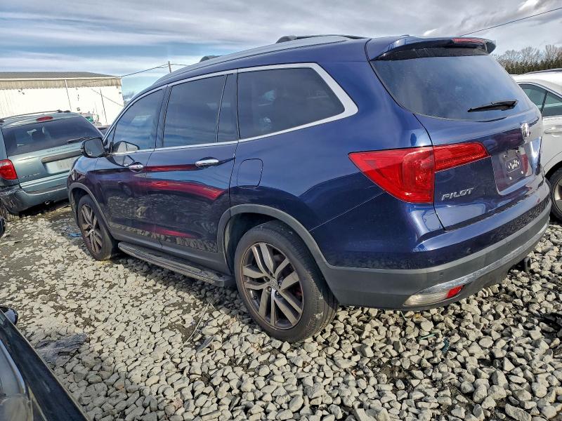 Photo 2 from auction – 2016 HONDA PILOT TOUR with VIN 5FNYF6H90GB021868