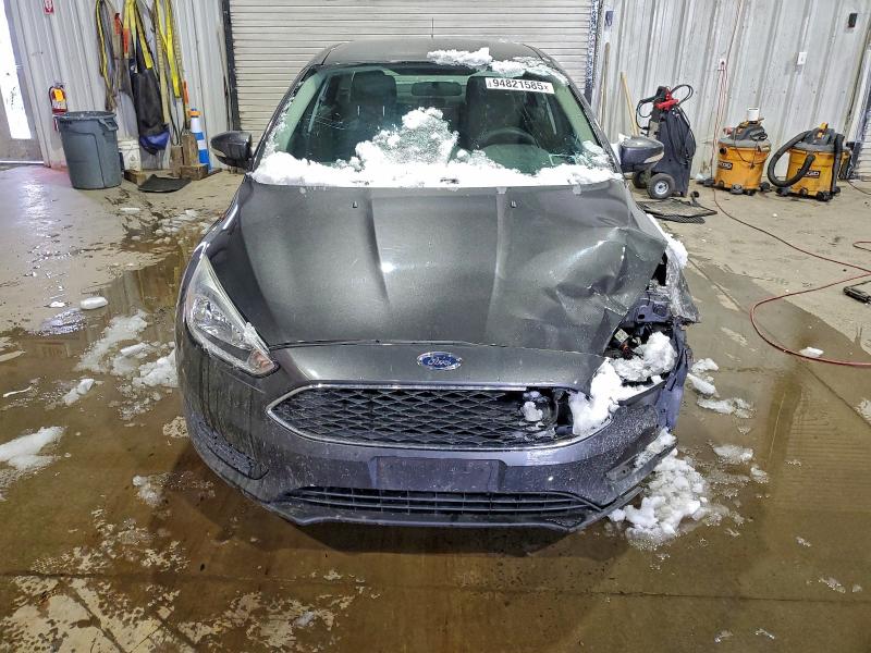 Photo 5 from auction – 2016 FORD FOCUS with VIN 1FADP3F25GL327726