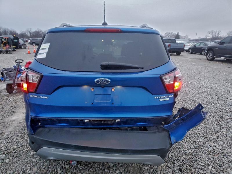 Photo 6 from auction – 2017 FORD ESCAPE TIT with VIN 1FMCU0JD6HUD08700