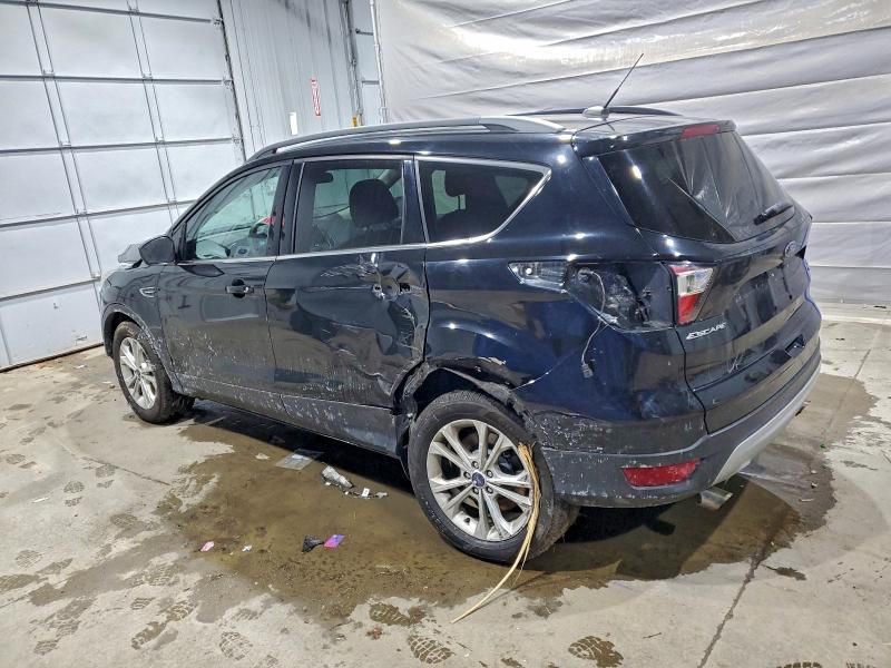 Photo 2 from auction – 2017 FORD ESCAPE SE with VIN 1FMCU9GD9HUC36693
