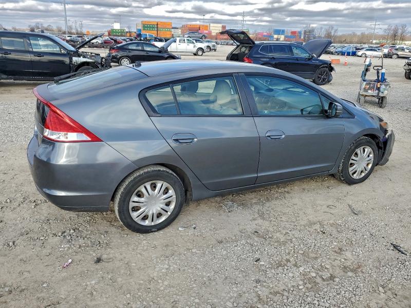 Photo 3 from auction – 2010 HONDA INSIGHT LX with VIN JHMZE2H5XAS042989