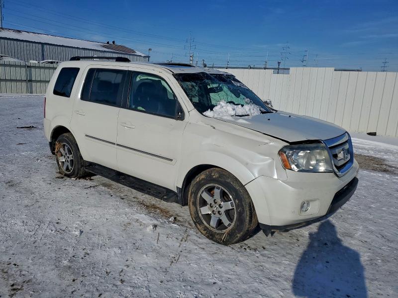 Photo 4 from auction – 2011 HONDA PILOT TOUR with VIN 5FNYF4H98BB073097
