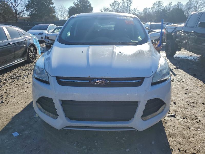 Photo 5 from auction – 2016 FORD ESCAPE SE with VIN 1FMCU9GX2GUC40402