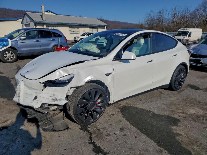 TESLA MODEL Y 2025 with VIN 7SAYGDEF2SA356084 - Photo from auction